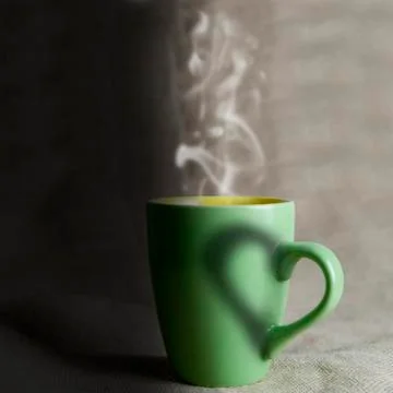 Mug with hot coffee. Stock Photos