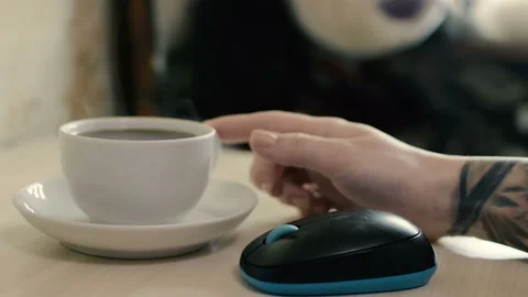 Mug of hot drink on the table. close-up. HD Video stock 98655288