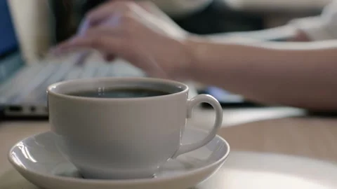Mug of hot drink on the table. close-up. HD 動画素材 98656259