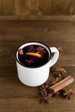 A mug of hot red e mulled wine with spices Stock Photos
