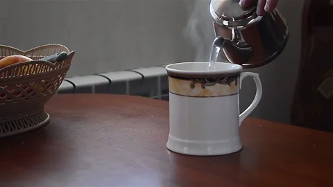 Mug of hot tea. Hot tea Stock Footage 170297427