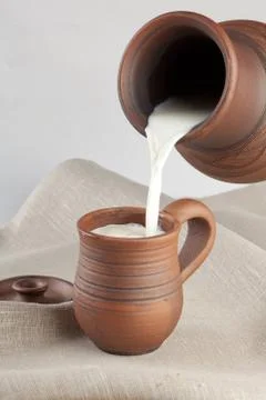 Mug with milk Stock Photos