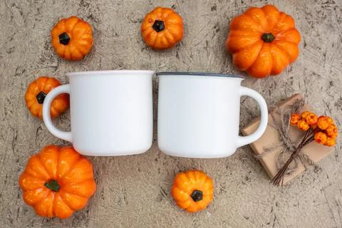 Mug mockup and pumpkins flat lay on wooden Stock Photos