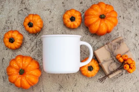 Mug mockup and pumpkins flat lay on wooden Stock Photos