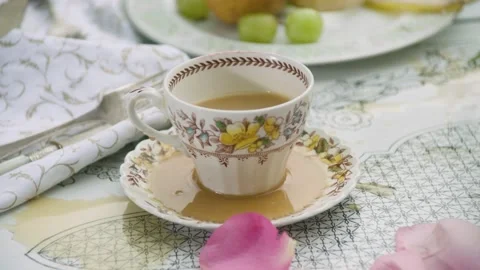 Mug Overflowing with Coffee on Table 動画素材 236057293