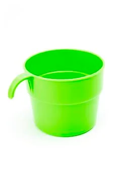 Mug plastic green Stock Photos