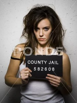 Mug shot of disheveled woman Stock Photos