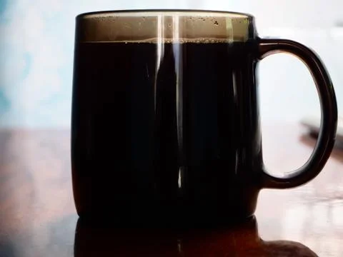 Mug with strong coffee Stock Photos