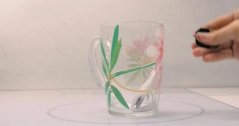 A mug with a tea bag 스톡 동영상 145246037