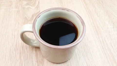 Mug of tea. Fresh black tea in a mug. Tea drinking. Stock Footage 277351682
