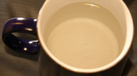 Mug of tea time laps Stock Footage 875889
