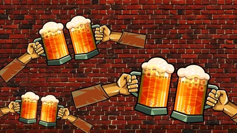 Mugs of beer on the background of a brick wall. Stock Footage 287078362