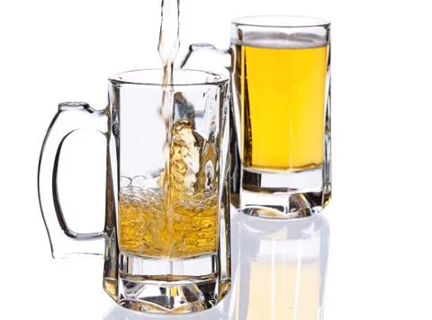 Mugs with beer Stock Photos