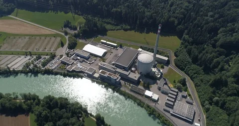 Mühleberg nuclear plant high lateral traveling - aerial 4K Stock Footage 113287553