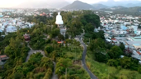 Mui Ne Buddhist Temple Drone Shot Rising With Amazing Mountain View From Behind Stock Footage 130409012