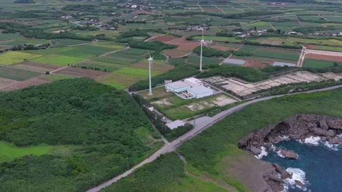 Muiga Cliffs - Wind Energy Windmills - Miyakojima - Okinawa - Japan - Locked Stock Footage 345369096