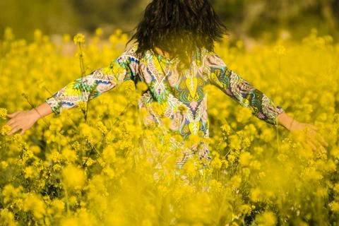 Mujer paseando entre flores amarillas, Mallorca,Islas Baleares,Spain. Stock Photos