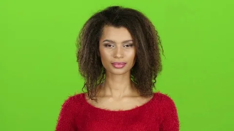 Mulatto female posing on camera, green screen. Slow motion, close-ups Stock Footage 75610187