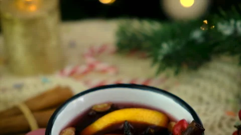 Mulled wine on the background of the Christmas tree. Selective focus. Stock Footage 221782601