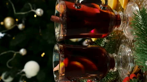Mulled wine on the background of the Christmas tree. Selective focus. Stock Footage 224374937