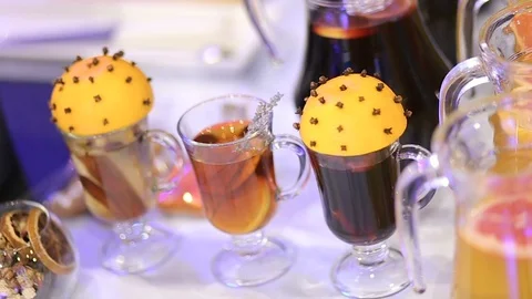 Mulled wine in night of New Year party and delicious Christmas drinks Stock Footage 99701676