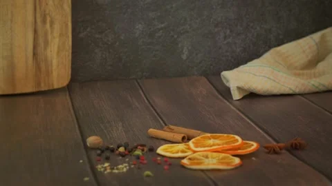 Mulled wine with orange and apple fruit, cinnamon spice poured in glass, mug Stock Footage 221328669