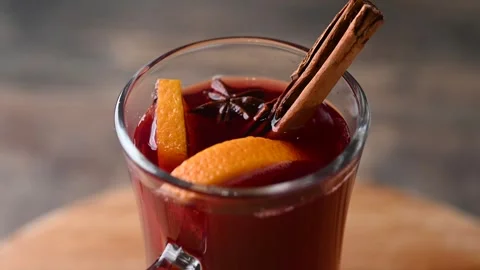 Mulled Wine with Orange and Cinnamon Sticks Stock Footage 321879211