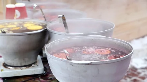 Mulled wine in pots Stock Footage 79991371