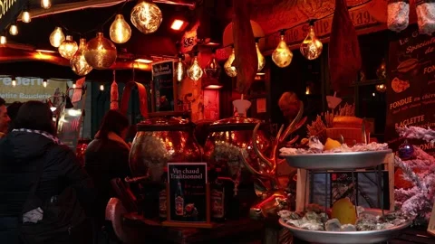 Mulled wine stall with cozy red lightning, Christmas markets. Stock Footage 327545219