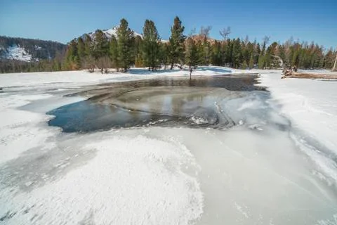 The Multa River in early spring, view from the lower Lake of Multin Stock Photos