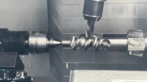 Multi-Axis CNC Machine Craft Metal into Precise Screw Threads. Stock Footage 251350262
