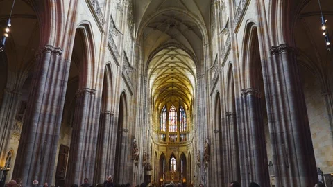 Multi-axis gimbal clip entering the nave of st vitus cathedral prague castle Stock Footage 89865954