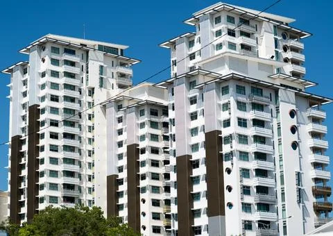 Multi block White and Bronze Colored High-rise Apartments in Darwin Australia Stock Photos