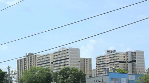 Multi-building demolition-implosion-explosion and dust cloud Stock Footage 7906109