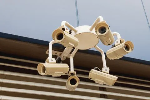 Multi-camera tracking device. Outdoor surveillance camera. Singapore. Stock Photos