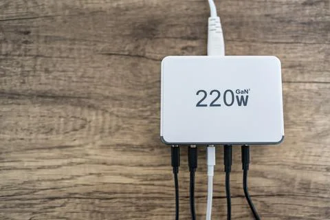 Multi charger with multiple outputs of different types in photo co copyspace. Stock Photos