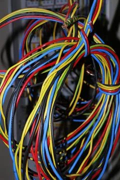 Multi color coded electrical cable wire in a work site Stock Photos