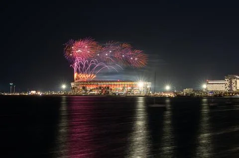 Multi Color Fireworks Display Over Stadium 974 and Rixos Gulf Hotel in Doha. Stock Photos