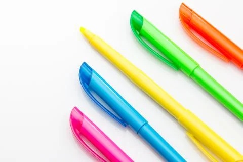 Multi color highlighters on white background. Stock Photos