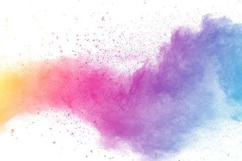 Multi color powder explosion on white background. Stock Photos