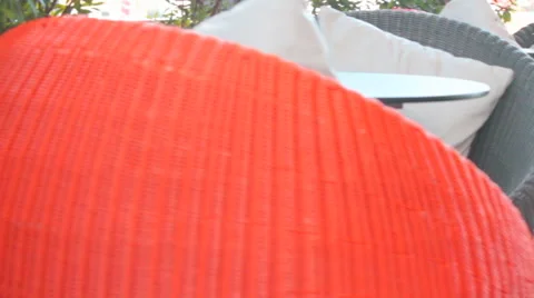 Multi color round wicker Table sets in garden Stock Footage 55752106