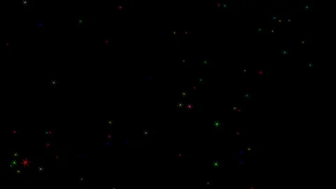 Multi color sparkles motion graphics with dark background Stock Footage 123814722