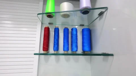 Multi color threads set to showcase Stock Footage 294687384