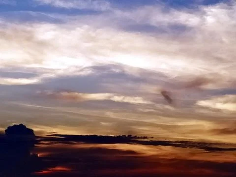 Multi colore clouds in the sky Stock Photos