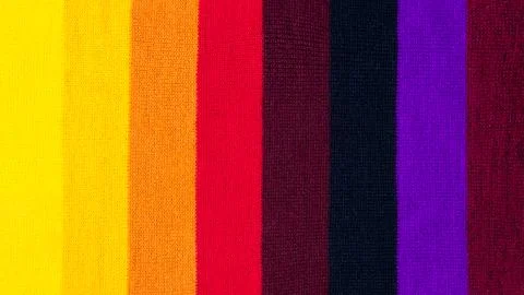 Multi colored background. knitted wool fabric texture with stripes Foto stock