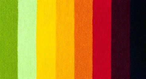 Multi colored background. knitted wool fabric texture with stripes Foto stock