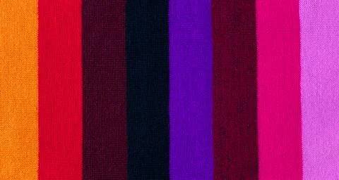 Multi colored background. knitted wool fabric texture with stripes Stock-Fotos