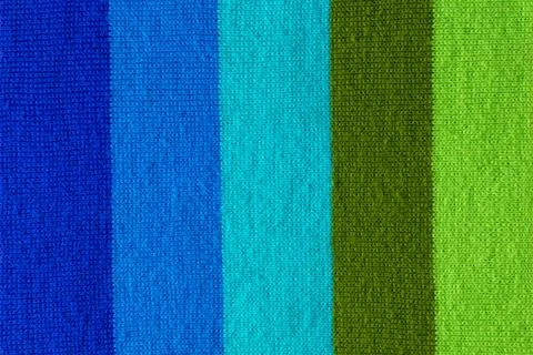 Multi colored background. knitted wool fabric texture with stripes Stock-Fotos