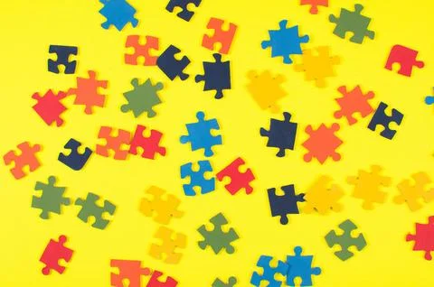 Multi-colored background from puzzles, block colors Stock Photos