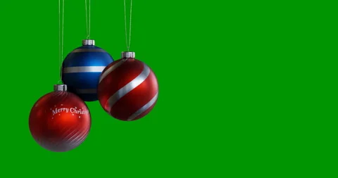 Multi-colored balls for Christmas holidays swinging on a green background. Stock Footage 143331992